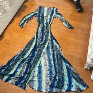 Long sleeve long dress with open slit. Snake print. Never worn